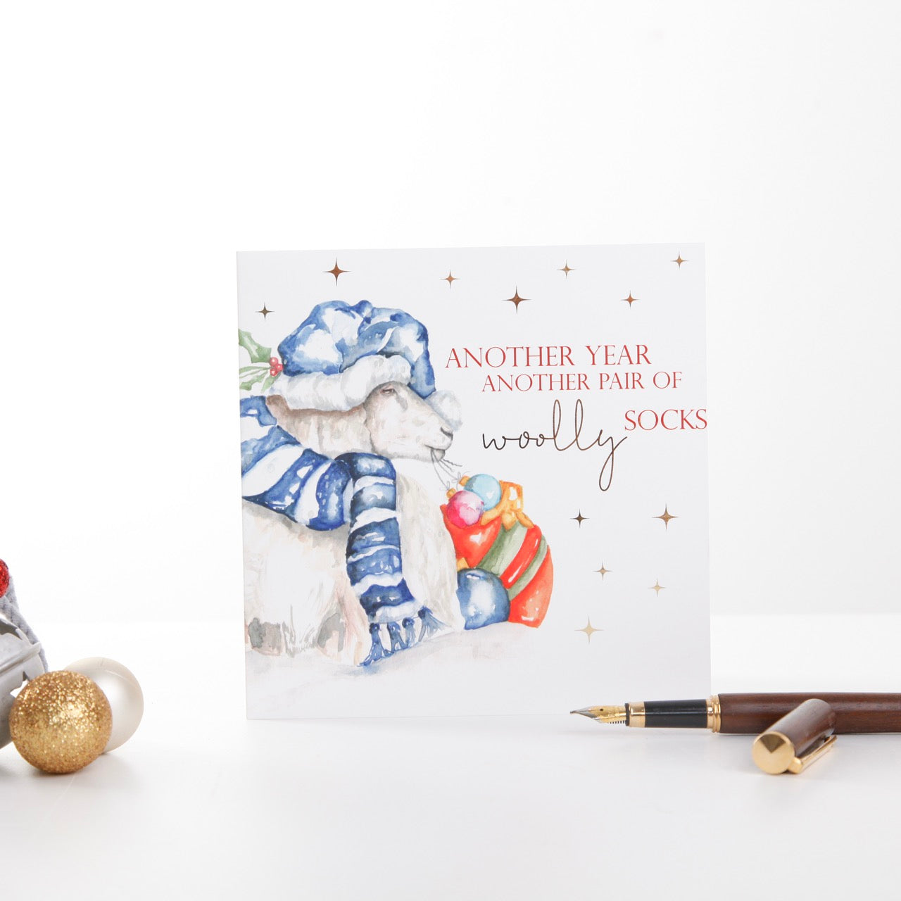 Festive Sheep Christmas Greeting Card 'Wooly Socks'